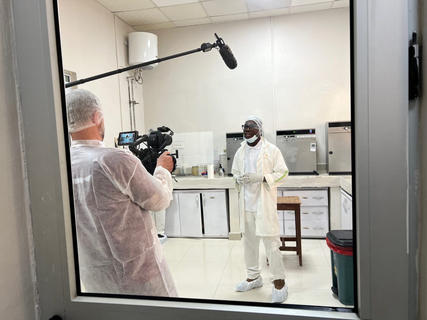 Camera crew capturing lab footage