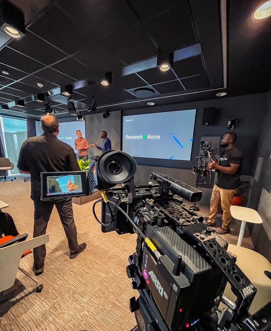 Film crew setting up in conference room