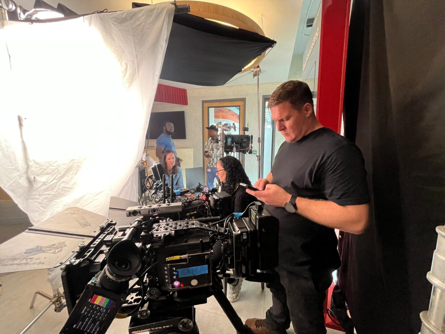 Film crew setting up camera equipment
